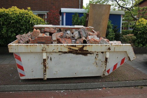 Professional flat clearance team at work in Mottingham